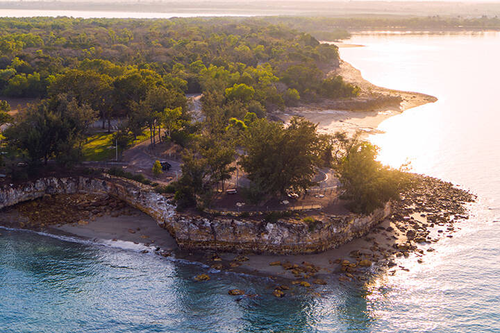 Aerial of Dudley Point, East Point Reserve. East Point Reserve is Darwin's largest park area.  It is popular with locals and visitors for its safe year-round saltwater swimming at Lake Alexander, military history, and the uninterrupted views of Darwin and Fannie Bay and sunsets from Dudley Point. It is has an extensive network of walking and cycling paths, landscaped picnic areas with free barbecue facilities and playgrounds for the kids.