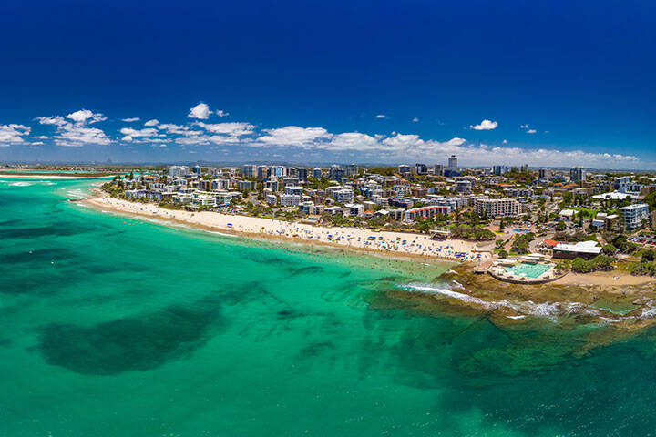 Aerial drone panoramic image of ocean waves on a Kings beach, Caloundra, Queensland, Australia 