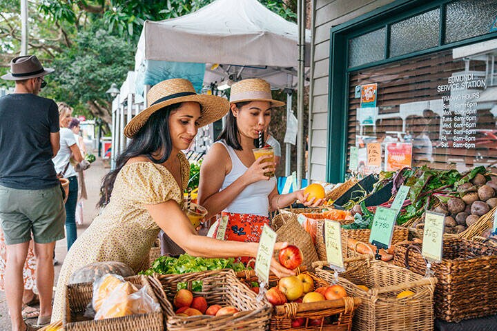 Shopping fresh organic produce at a Sunshine Coastjes market 