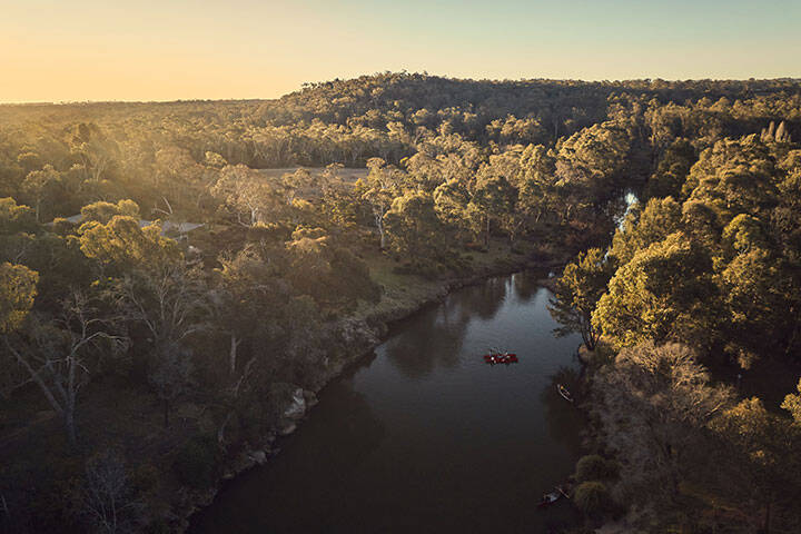 Aerial views of people canoeing in Kangaroo Valley