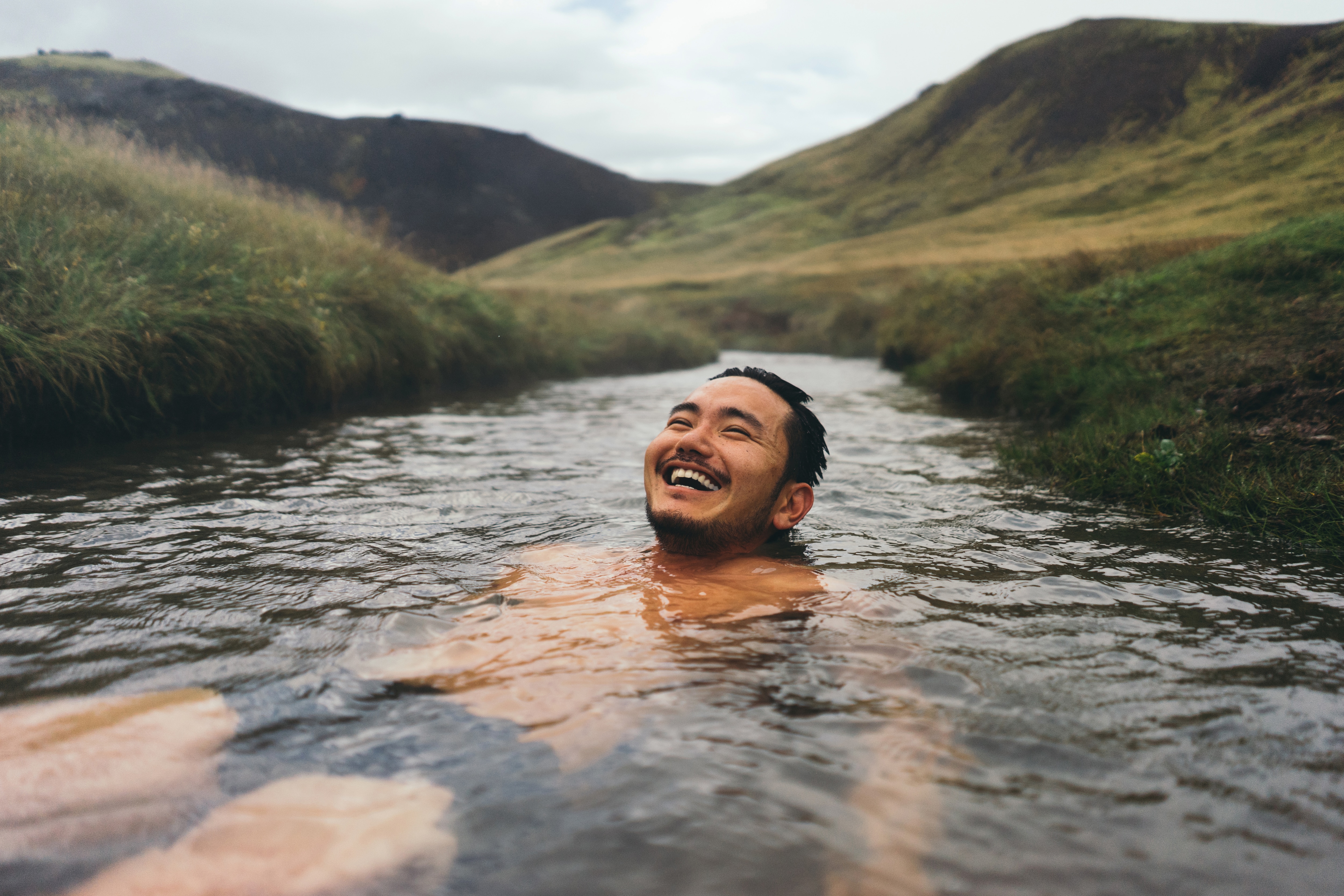 Man in Iceland hotspring 
